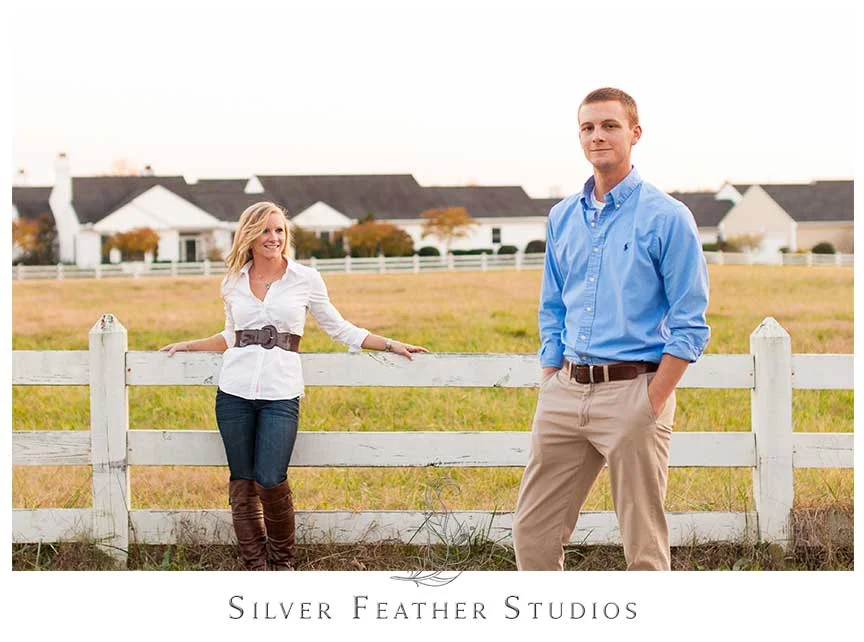 Modern posing on the cow pastures at Fearrington Village for this autumn engagement session. © Silver Feather Studios, Chapel Hill Wedding Videography and Photography