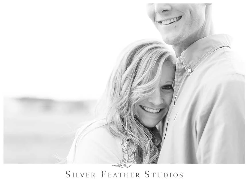 Fun cuddling at this romantic autumn Fearrington Village engagement session.© Silver Feather Studios, Chapel Hill Wedding Videography and Photography