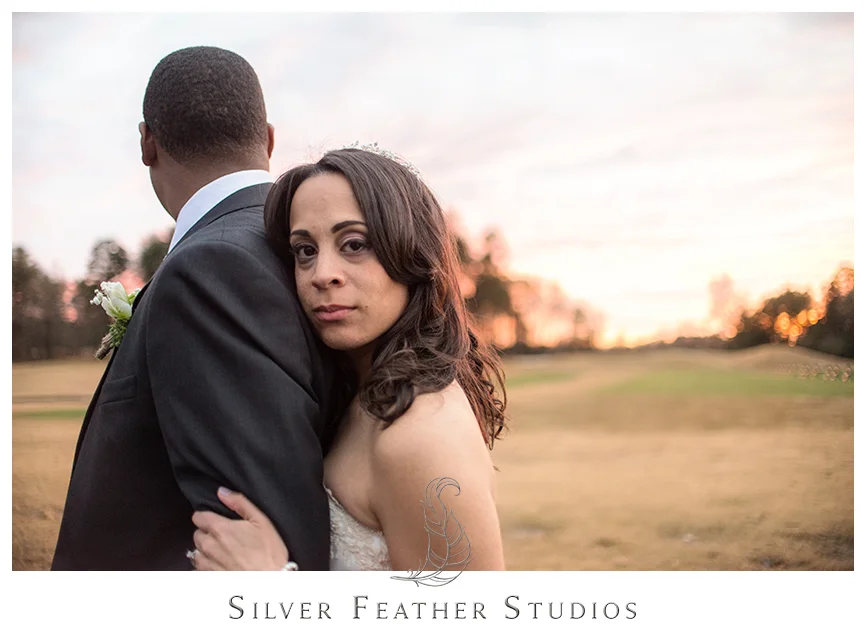 Bride and groom at their purple and grey Bryan Park Golf Center Wedding in Greensboro. © Silver Feather Studios, Wedding Photography in Greensboro, North Carolina.