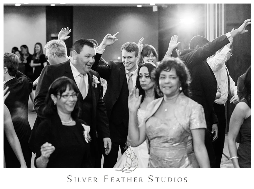 Instructor teaches guests a special dance at this Bryan Park Golf Center Wedding reception. © Silver Feather Studios, Wedding Photography in Greensboro, North Carolina.