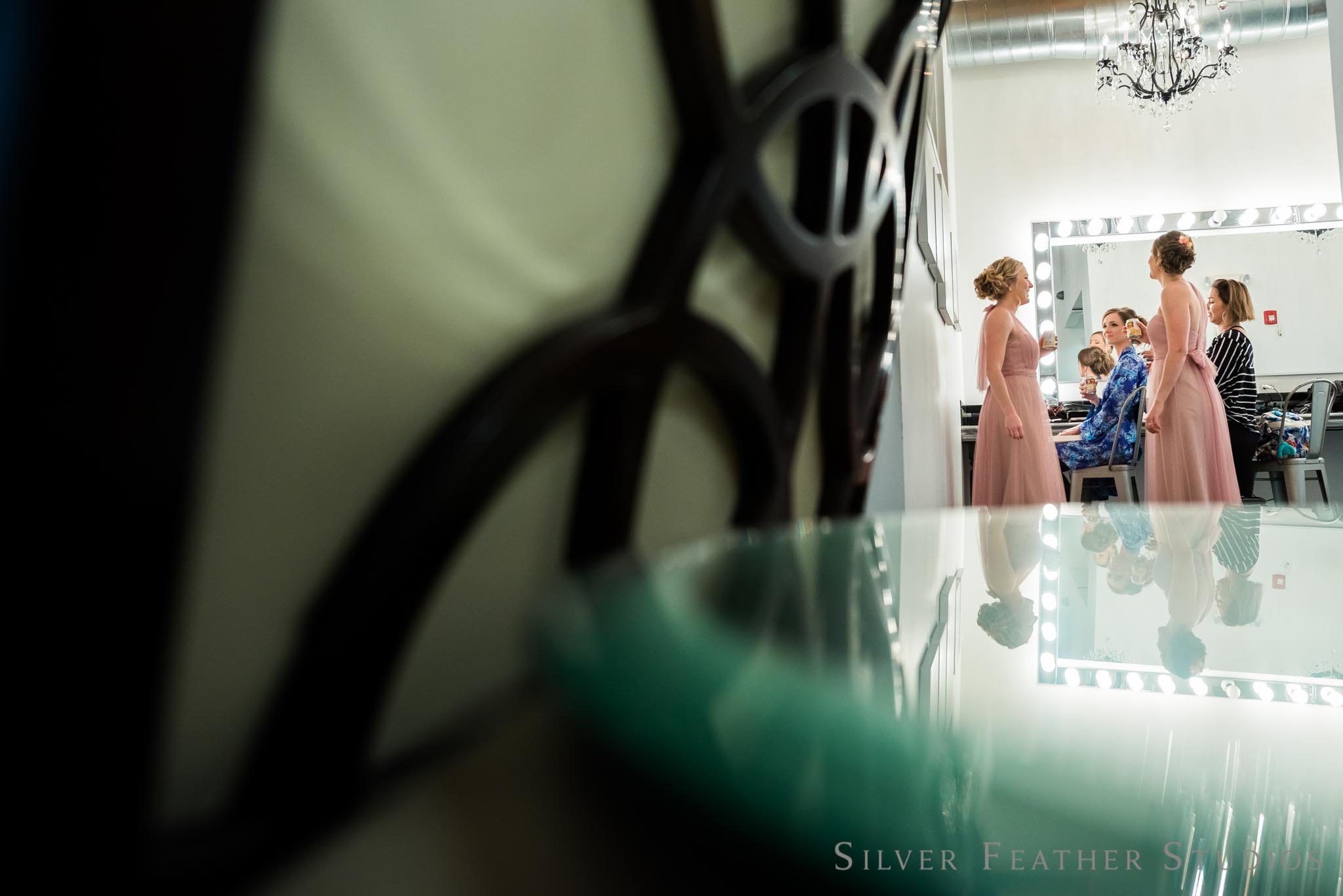 Anna getting ready for her Cotton Room wedding in Durham. © Silver Feather Studios, Burlington wedding photographer