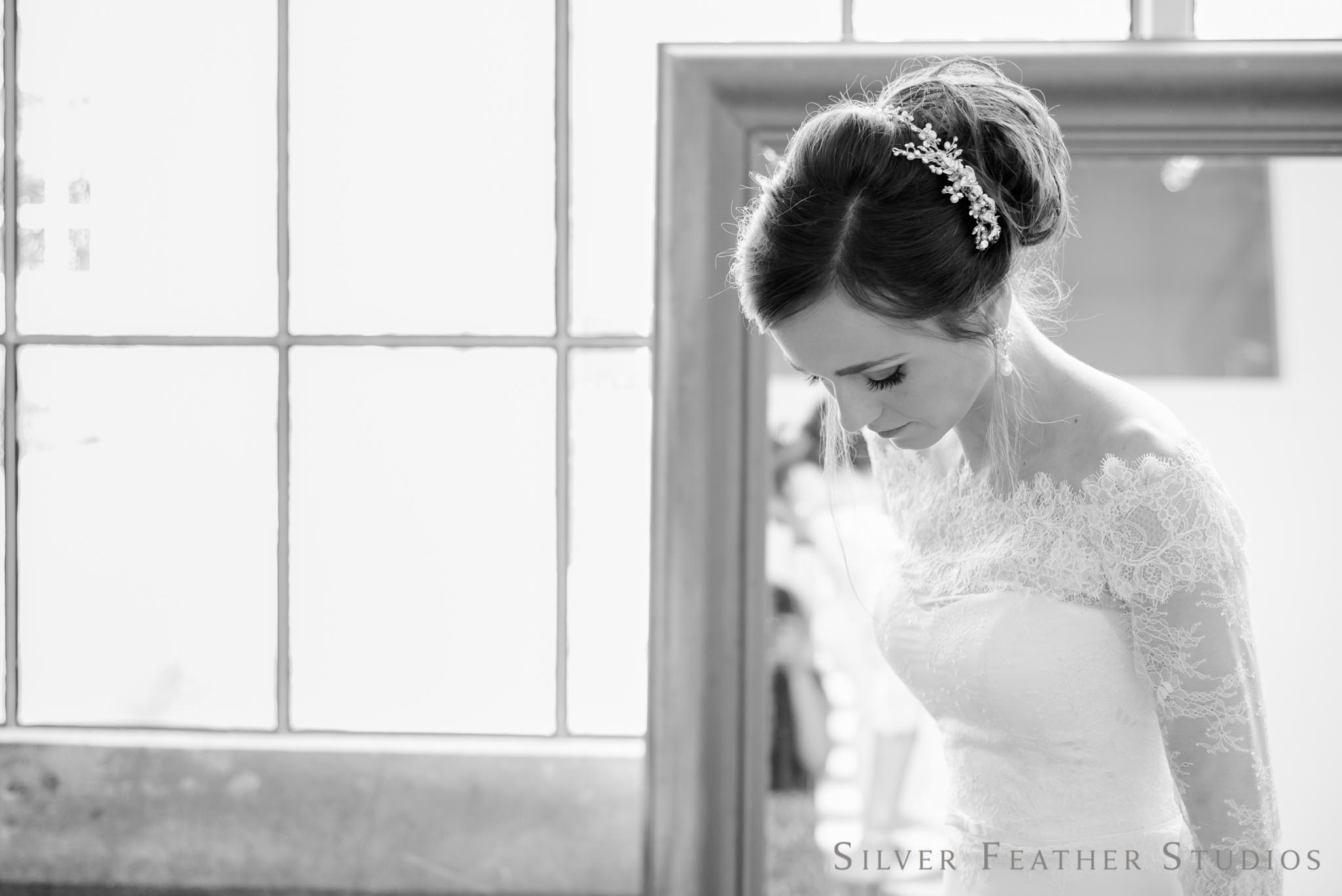 Anna getting ready for her Cotton Room wedding in Durham. © Silver Feather Studios, Burlington wedding photographer
