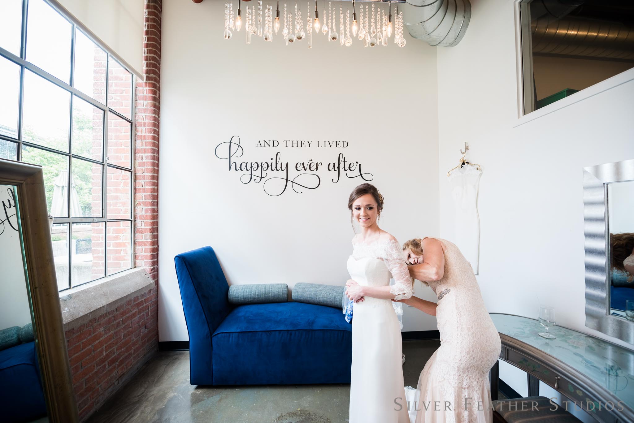 Anna getting ready for her Cotton Room wedding in Durham. © Silver Feather Studios, Burlington wedding photographer