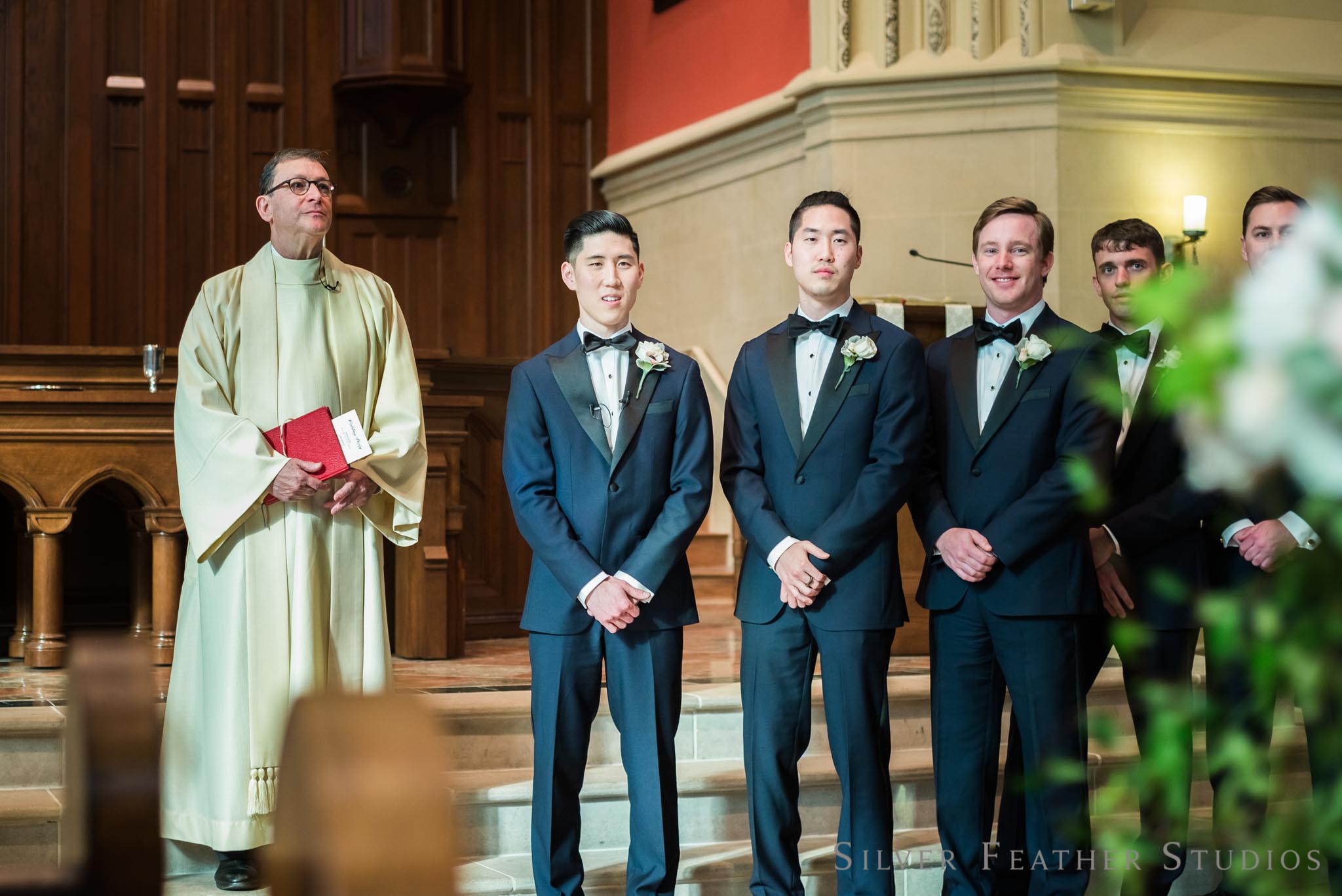 groom waiting for his bride at the First Presbyterian church in Durham, NC. © Silver Feather Studios