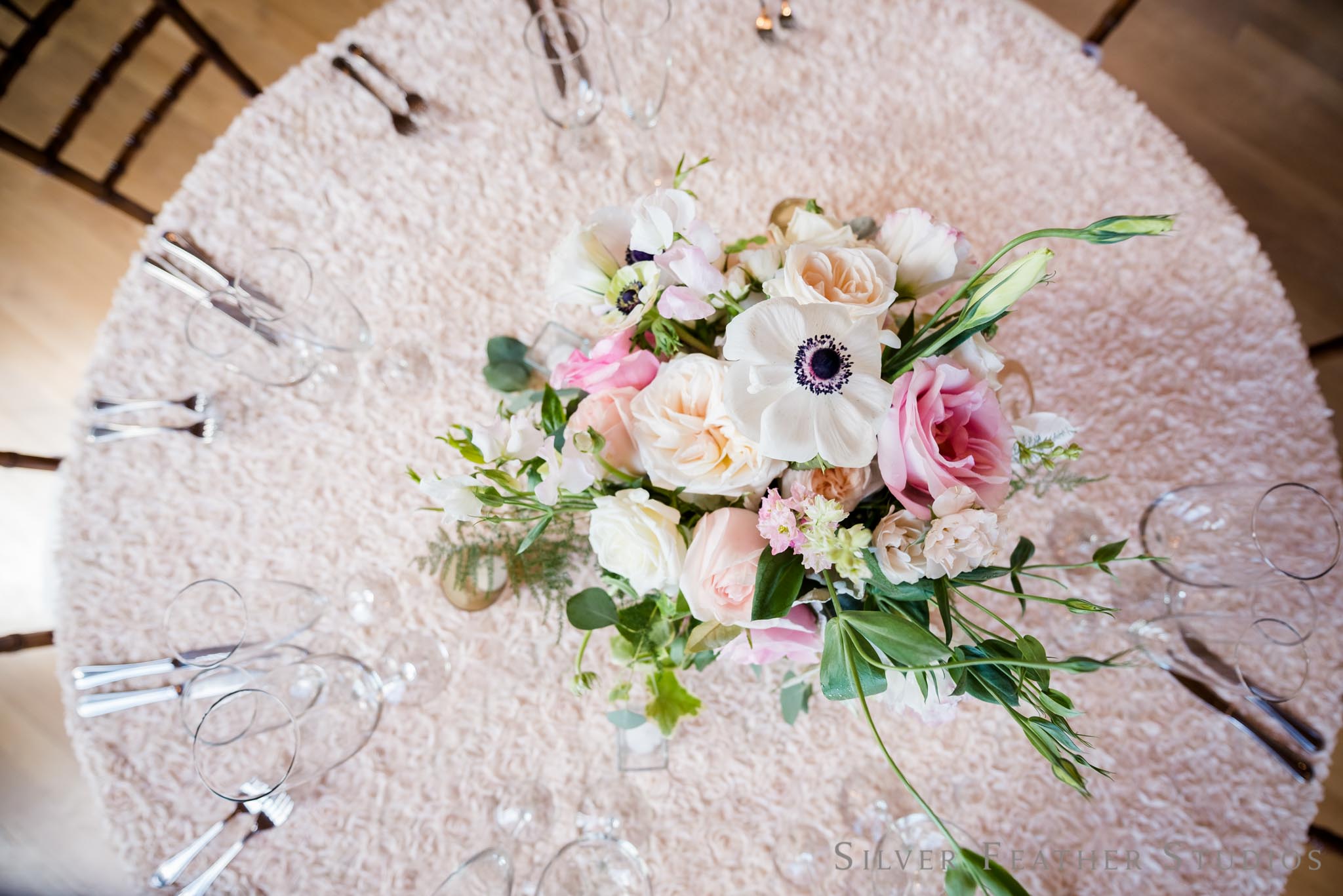 floral centerpieces by Mew Designs in Durham, NC © Silver Feather Studios, Cotton Room wedding photography