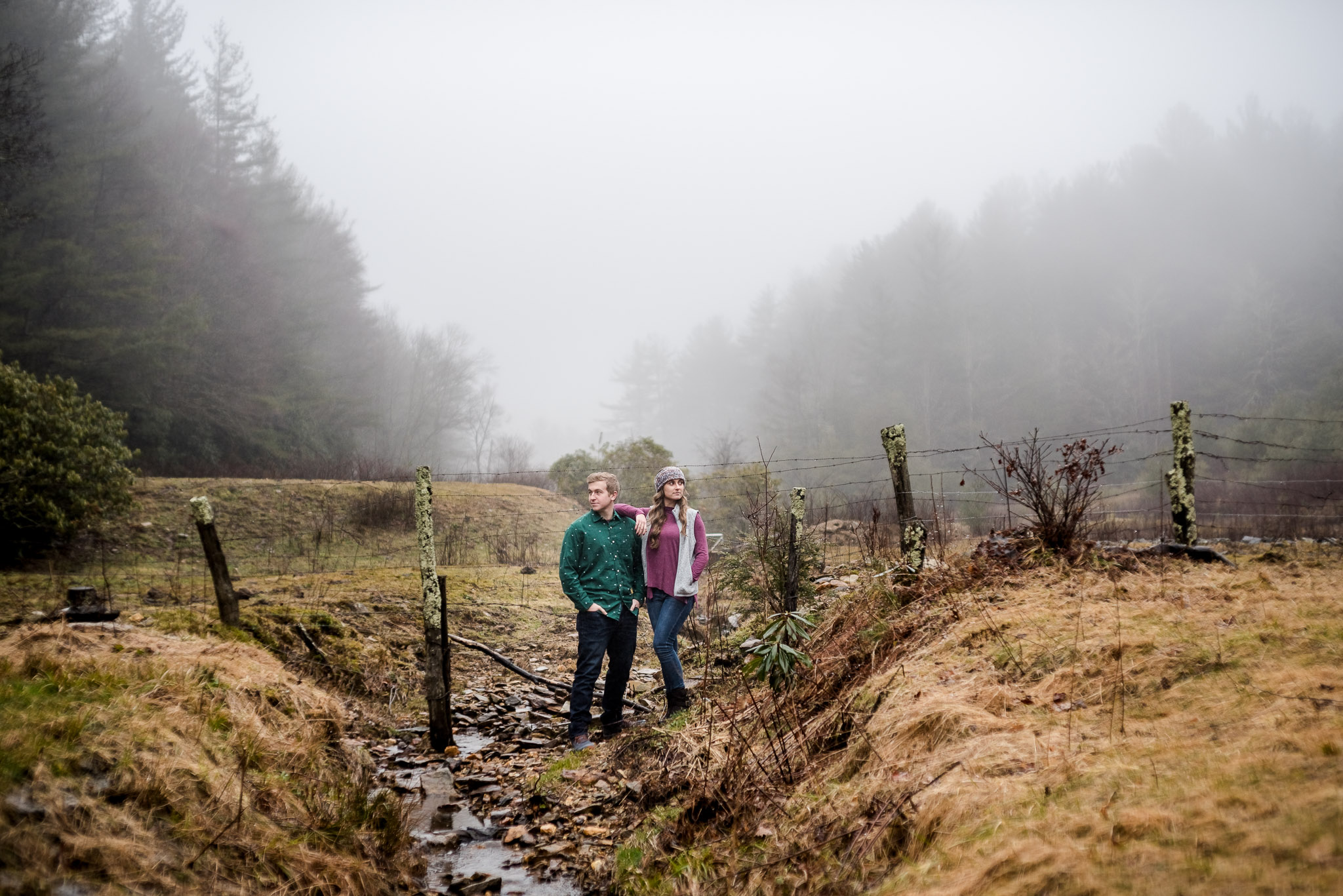 blowing rock engagement session in a foggy park