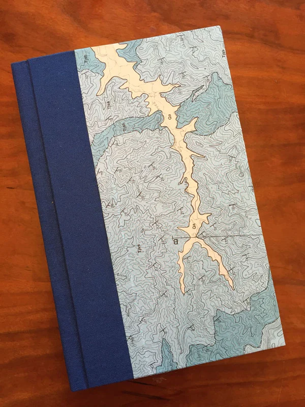 A case book I made in class with Laura Rowley. The cover is made from a geological map by Tom Diblee, who was a geologist and family friend. He walked much of California to make maps like these; they are gorgeous. 