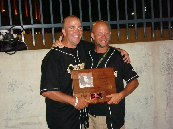 Matt and Ben holding DCI's Jim Ott Trophy for Outstanding Brass Performance. This trophy is given to the highest averaged brass score at the DCI World Championships. 