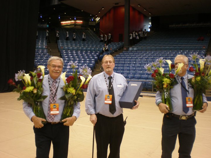 Jim (center) with fellow WGI administrators at the WGI World Championships.
