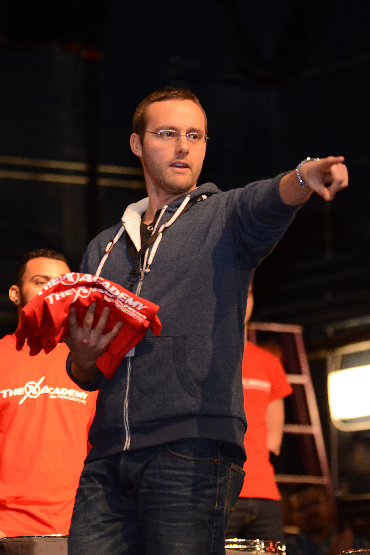 Tim Jackson - Rhythm X's battery arranger and coordinator - awards some t-shirts at last year's event.