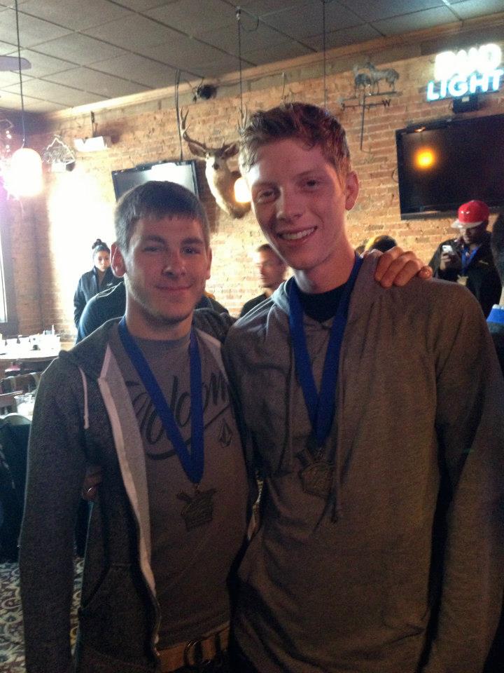 Frank Cummings (#274), left & Michael Tant (#311), right take a photo at the Rhythm X banquet following their 2013 WGI Percussion win.