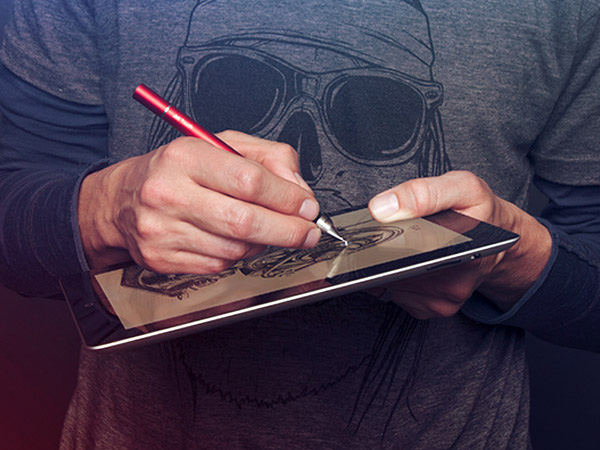 I drew on my iPad with a Jot Touch, usually in the app called Procreate. (This photo isn't me.)
