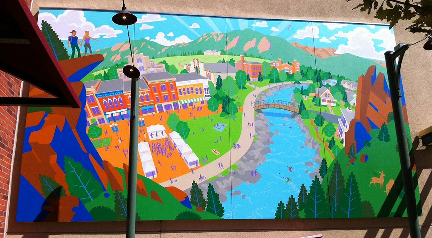 The mural is a fictional viewpoint combining many of Boulder's natural and architectural landmarks into a tribute to the town.