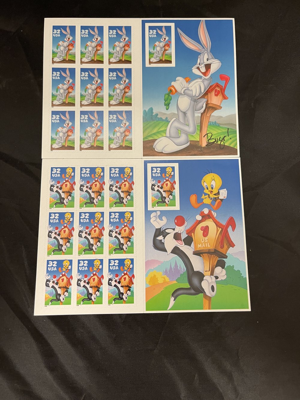 2 sheets of USPS stamps, One Bugs Bunny, One Sylvester and Tweety
