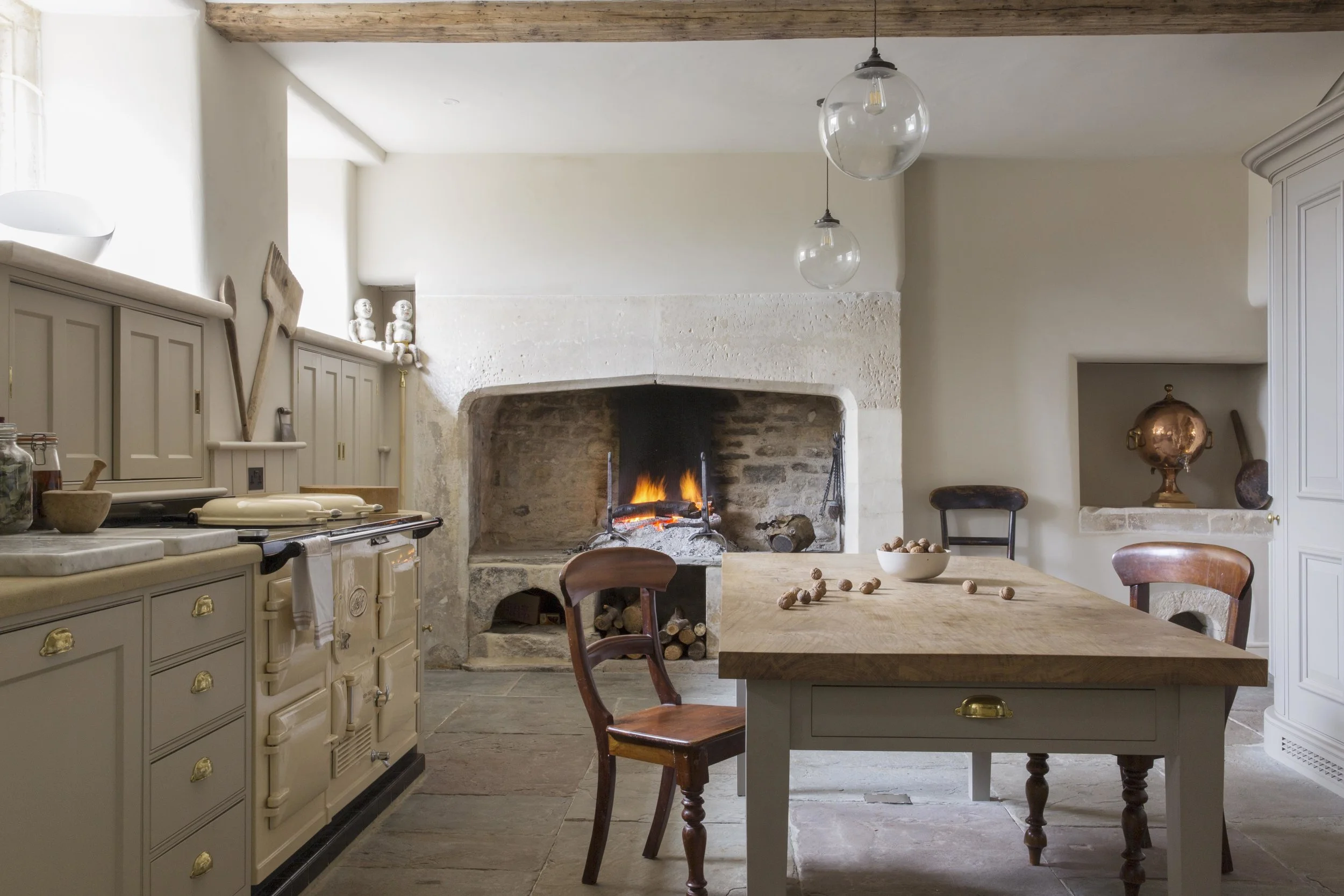 The original open fireplace adds character and authenticity.