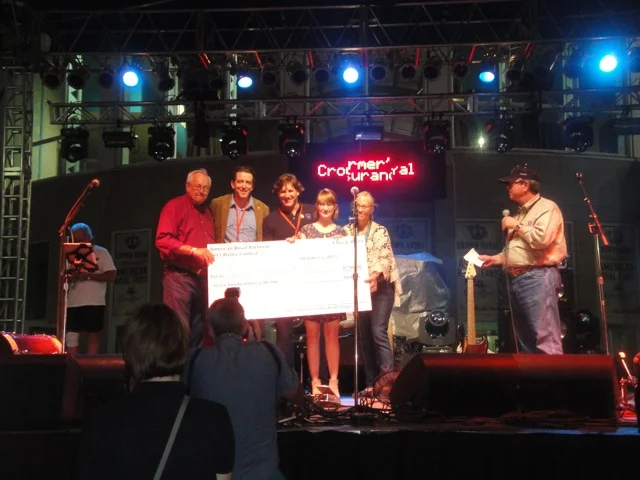 Christina Larkins, receiving her award at the American Royal