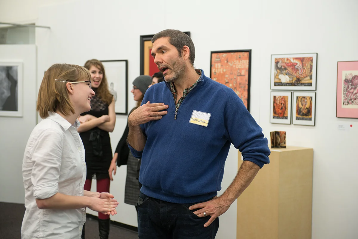 Professor David Terrill and senior Christina Larkins talking about the show.