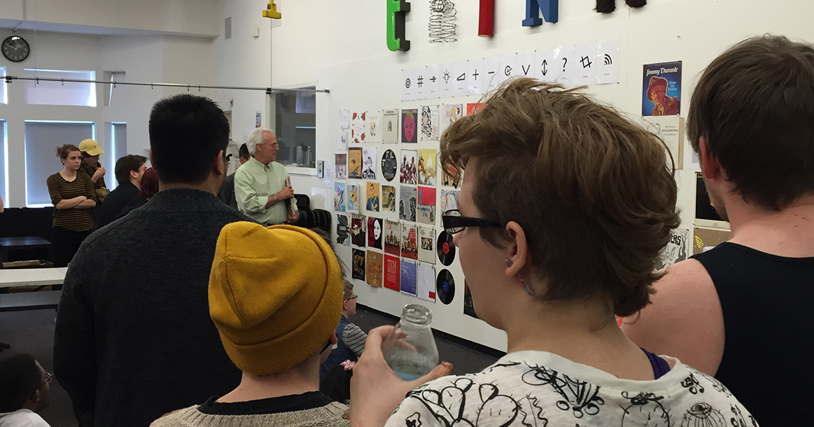Professor Steve Mayse with students, checking out all the solutions to the Mystery Project