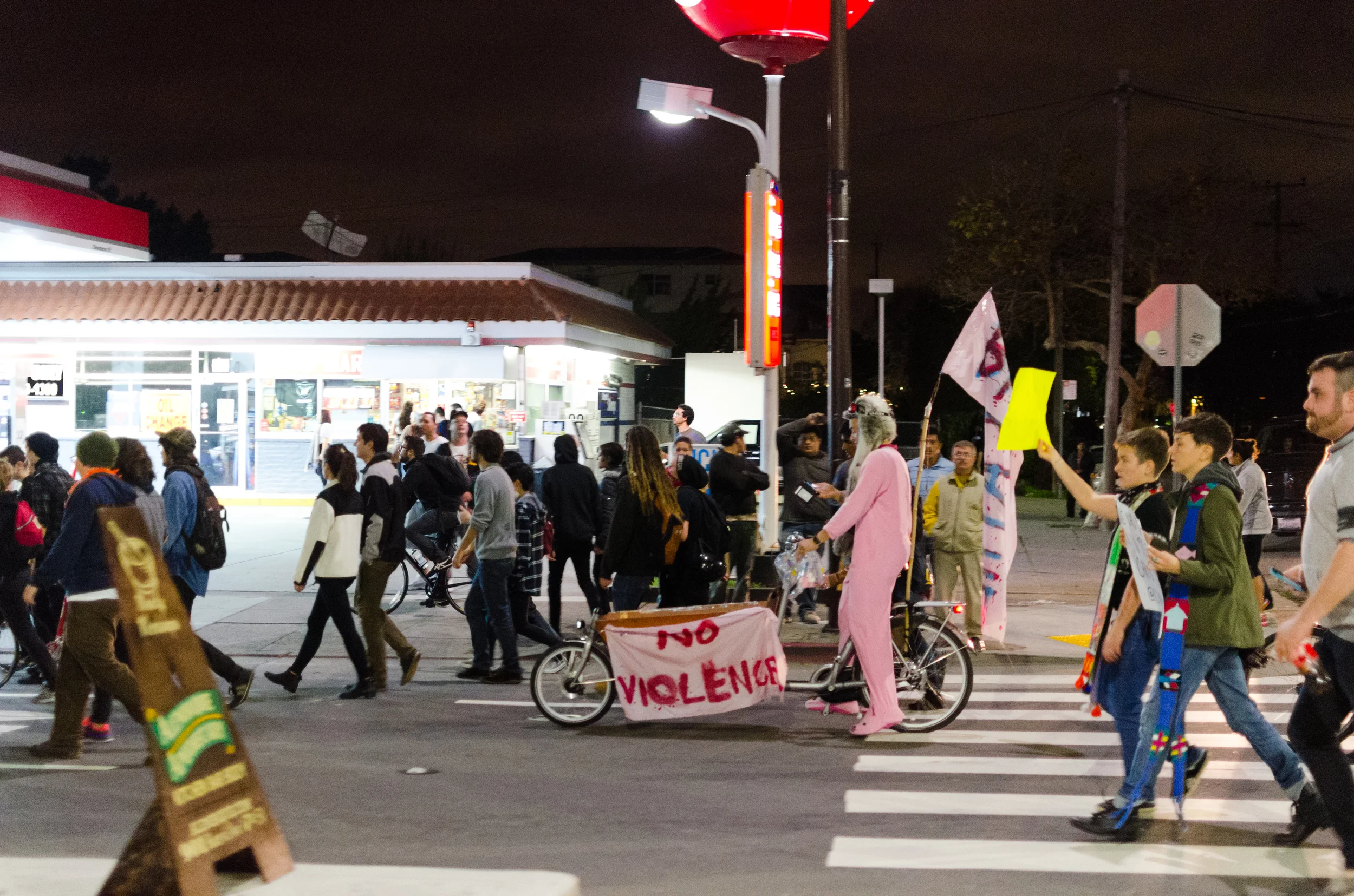 Marshmallow man. This man was riding along throwing pink marshmallows out to the crowd - photo by Kyle Cameron
