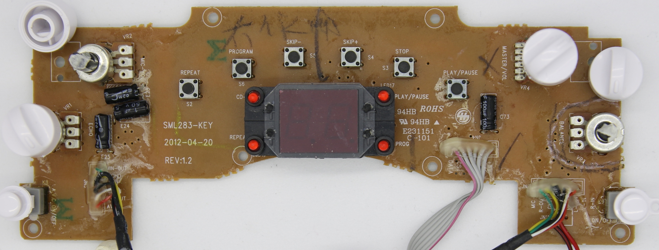 Figure 3-6: Karaoke momentary press buttons on the board.The labels are in white above the buttons.