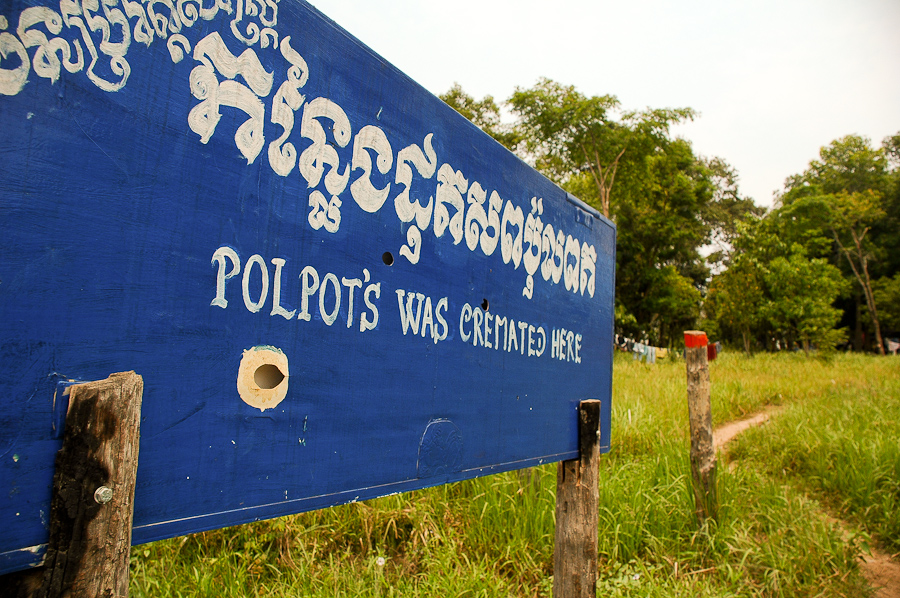  A road sign marks the location of Pol Pot's grave, near Anlong Veng, Cambodia. 