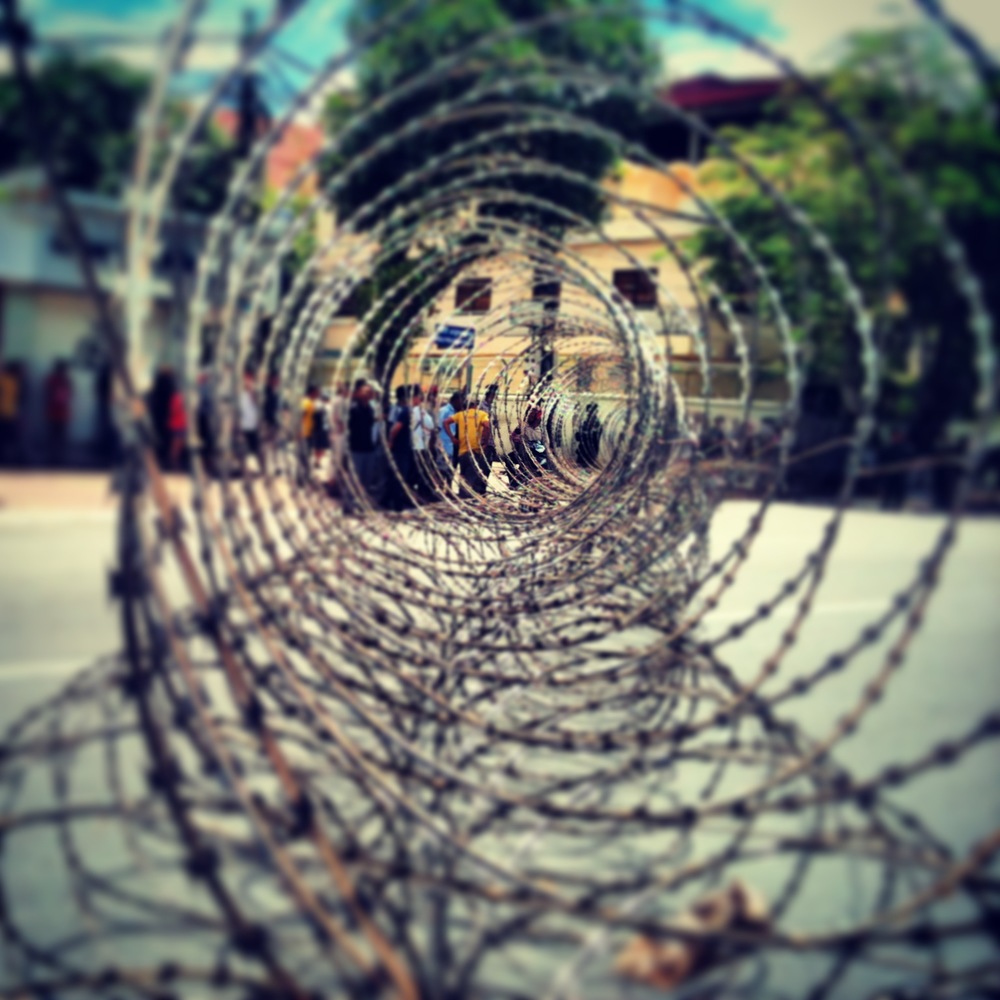  Barbed wire cordons off a section of central Phnom Penh near the residence of Prime Minister Hun Sen. 