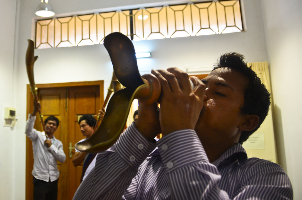  A musician plays a trumpet at a rehearsal in Phnom Penh. 