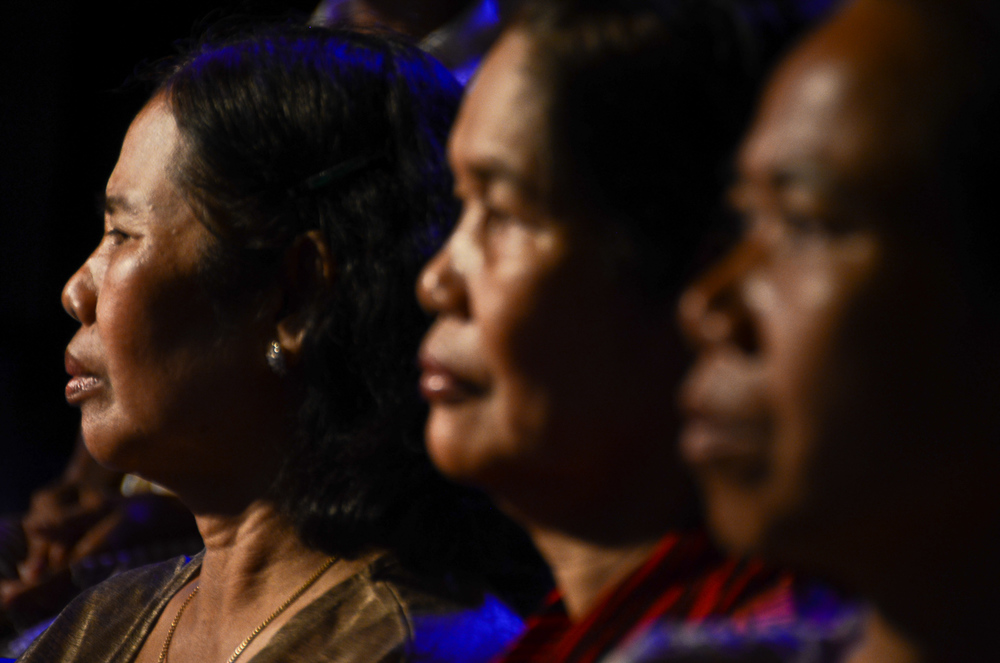  Audience members watch a taping of the Cambodian reality television show, 'It's Not a Dream.' The show re-unites families separated by the Khmer Rouge. Many among the audience have been through similar experiences. 