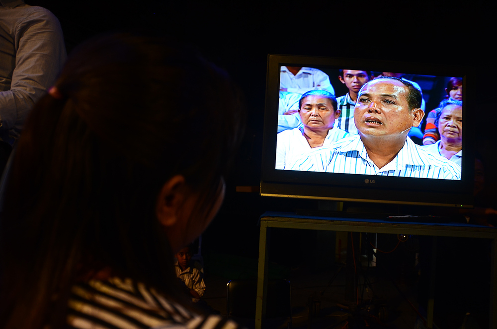  The show's producer Prak Sokhayouk, watches the screen as taping begins for 'It's Not a Dream'. Many of the staffmembers who work on the production are young and did not live through the Khmer Rouge regime. 