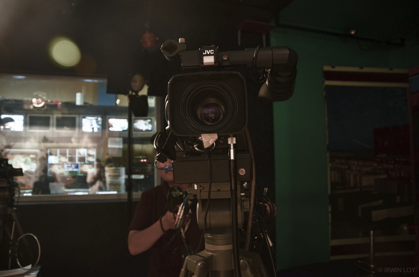  A camera operator gets ready to film the evening newscast at RuaiTV, a community TV station in Pontianak, West Kalimantan. 