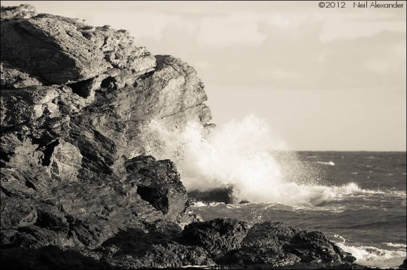 Waves crashing onto the cliffs by Trearddur Bay, Anglesey