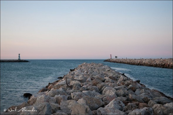 E ntrance to the harbour at Vilamoura Portugal with lighthouses either side - 1/125 second