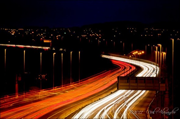 M 6, Shevington in rush hour with the town of Orrell in the background (Click for larger) D300 w/ 70-200 F2.8 at 200mm. 30secs at F8