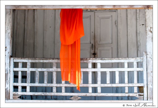 M onk's robe in Wat Visounnarath, Luang Prabang by Neil Alexander
