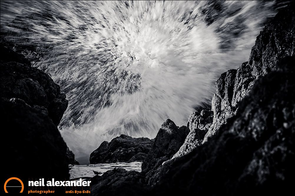 Waves crashing on the Rhosneigr beach, Anglesey, Wales, UK. amera settings: F2.8, 1/400 sec, ISO 200. 185mm