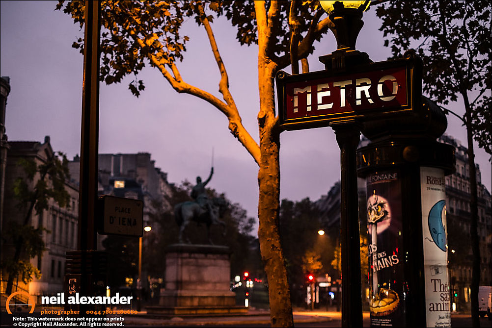 Paris Metro sign at night