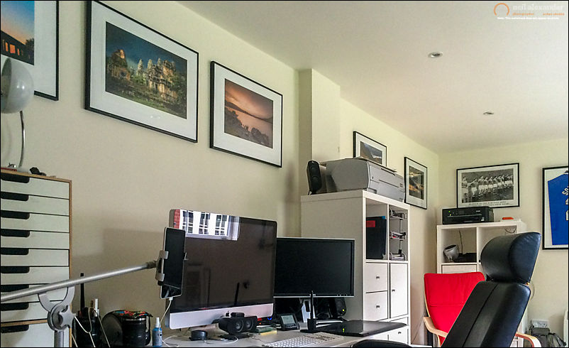 Photos hung on the new walls all perfectly aligned.