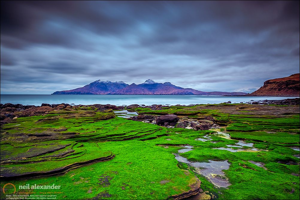 Fear is dark but my love is a lantern shining up like coins in a fountain The island of Rùm from the Singing Sands on Eigg. Click here for prints.