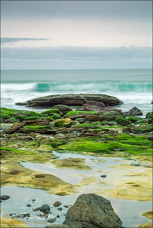 Waves crashing onto the short of the Singing Sands, Eigg. Click to view large.