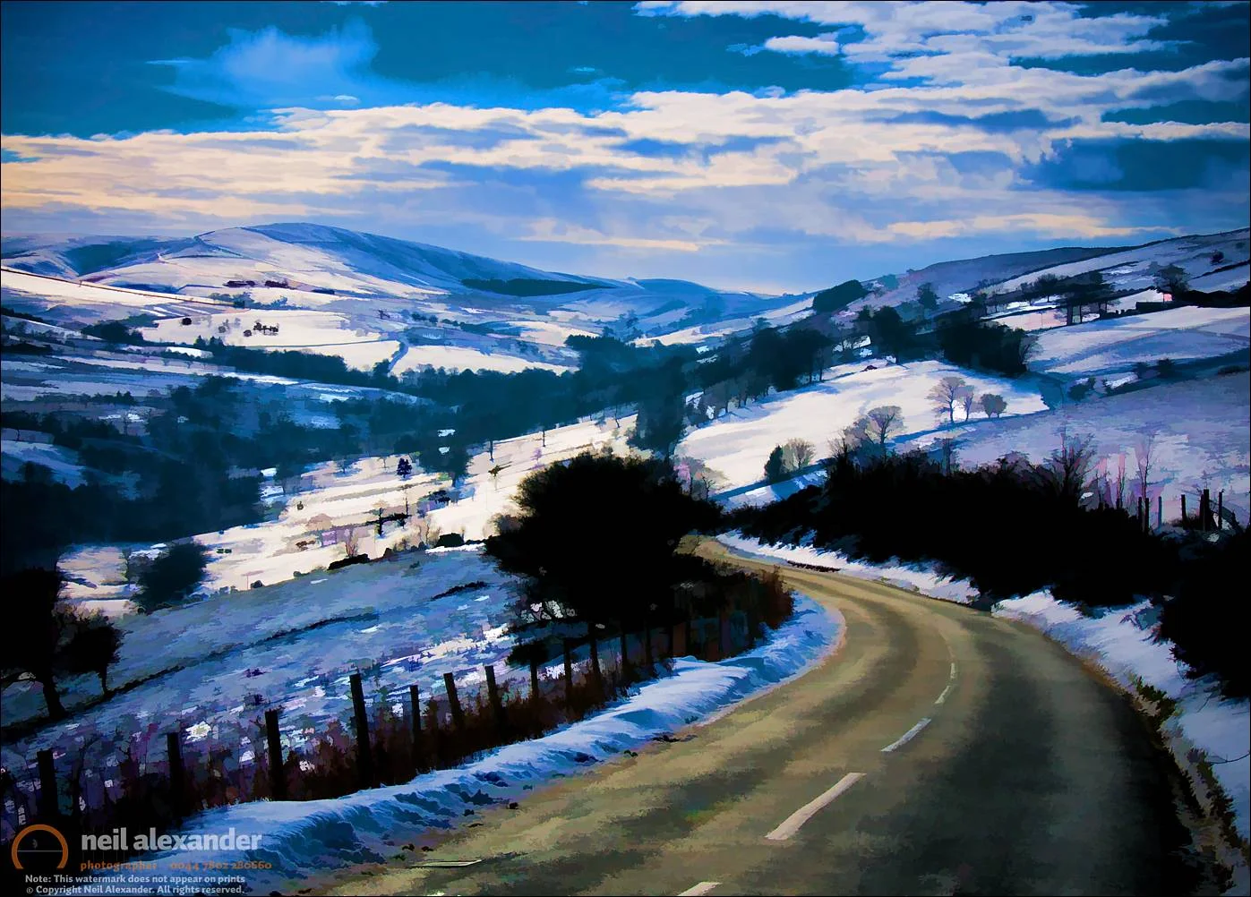 Snowy scene and rural road, Peak District, England, UK