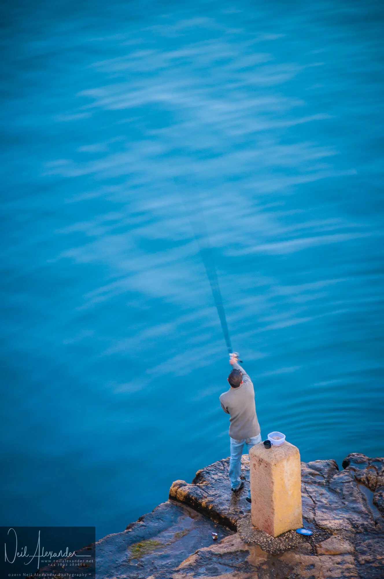 A man fishing by Valletta harbour-Neil_Alexander-10.jpg