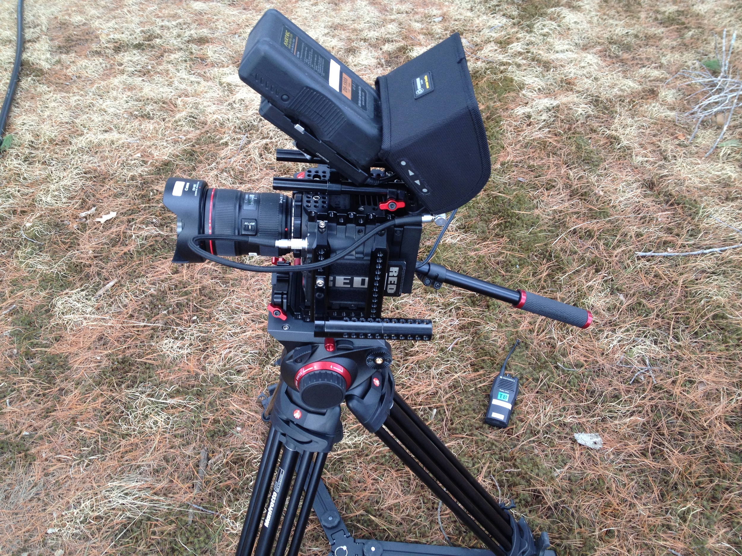 Epic shown with side handle, v-mount battery on 15mm rails, 5" touch screen with lens hood, manfrotto 509HD tripod, Canon ef lens mount