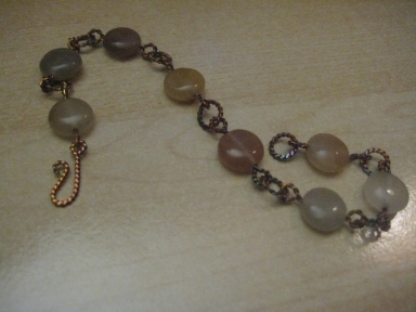 The first piece of wire jewelry I ever made back in January 2011. I'm not sure why I made it so hard by creating twisted wire to use for it! LOL! I can't even remember how many hours it took me to do this, but thankfully my skills have much improved ;) And I have a much better camera!