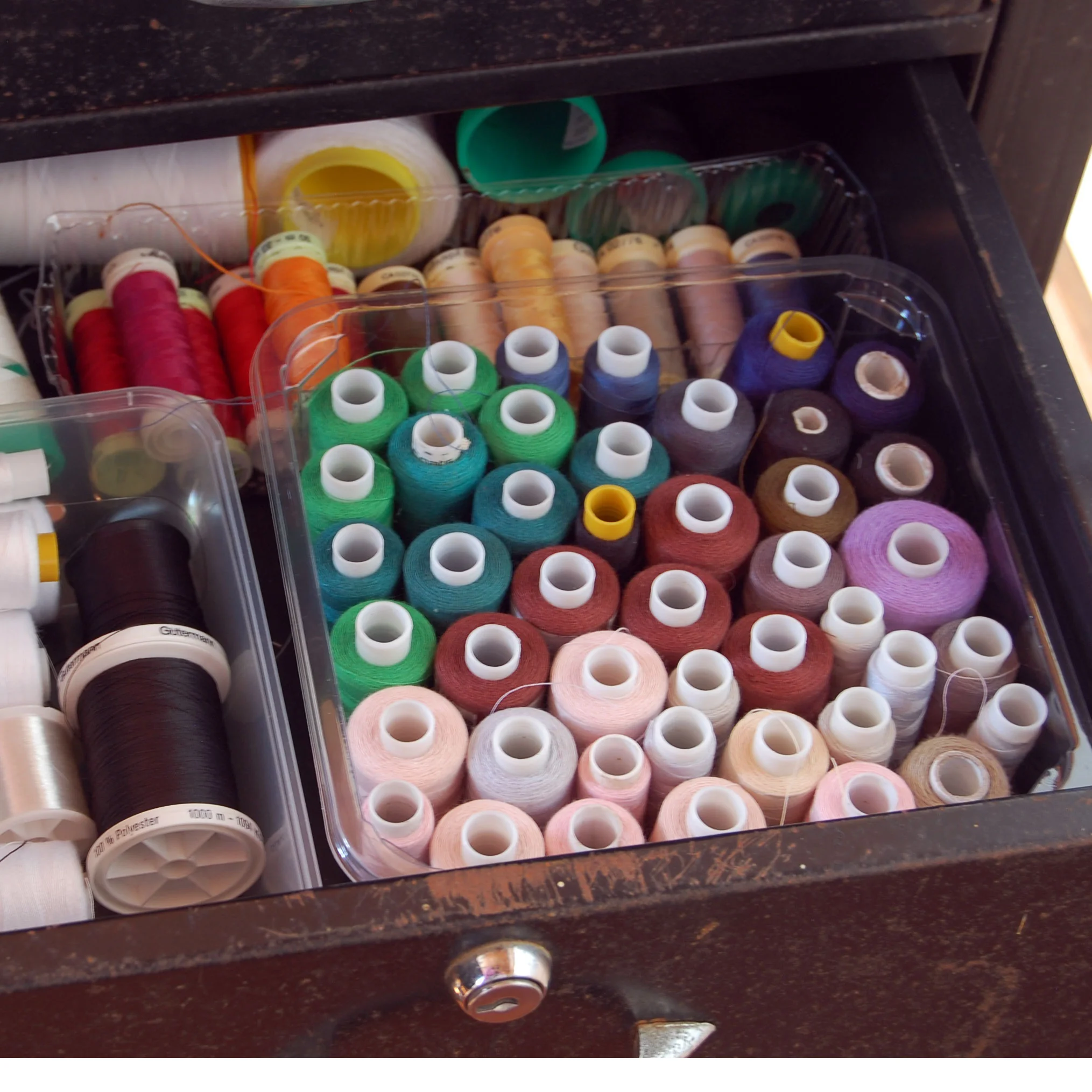 My thread now lives in regimented order inside an old desk drawer.