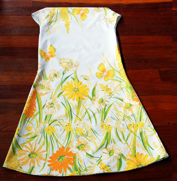 Simple to sew, the Daisy Dress is a blank canvas to bedeck with your favourite flowers. This version is sewn from a vintage sheet.