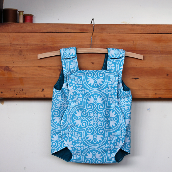 Perfect gift to stash away for a newborn baby! The Archie Playsuit was designed by my step-daughter Anna especially for hot weather and ease of dressing. Yes, instead of pushing unco-operative limbs through the garment, this playsuit opens out flat and clips on around baby. It's reversible too! Pattern coming soon, but I have a few prototypes for sale...