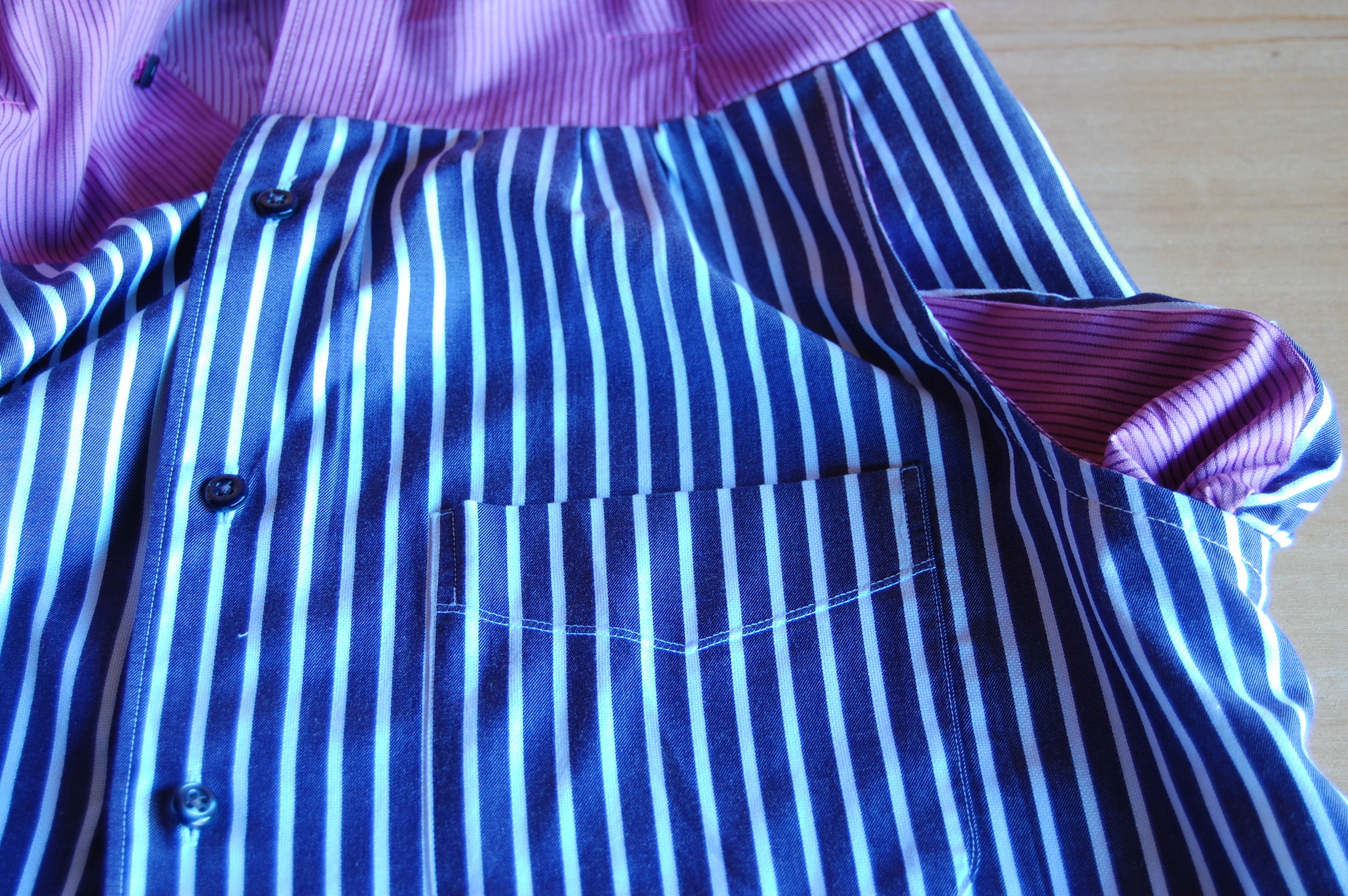 Can you see how the armpit of the shirt was cut away and replaced with a side pocket. I used the pink shirt sleeve for the pocket facing.