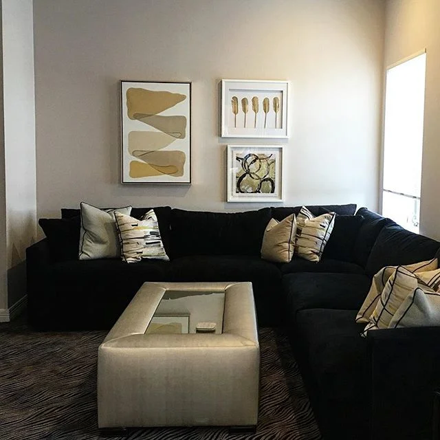 Black is Back. #livingroom #velvet #customsofa #custom #gold #golddecor #vinylcoffeetable #pillows #neverenough #goldart #lillylevydesigns #interiordesign  @zoffanyfw @crateandbarrel @kravetinc @zgallerie  Email marilyn@lillylevydesigns.com