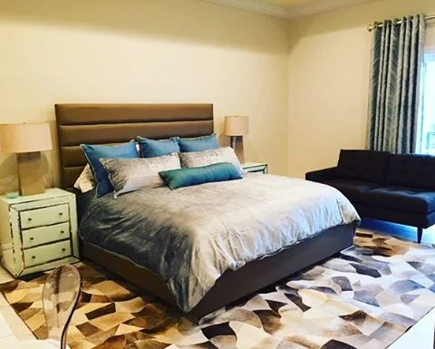 Sleep in Style.
.
.
.
#customleatherbed #glassnightstands #hiderug #lucitechair #modernbedroom #luxurybedding #lillylevydesigns #interiordesign #makeityours  For info email Marilyn@lillylevydesigns.com