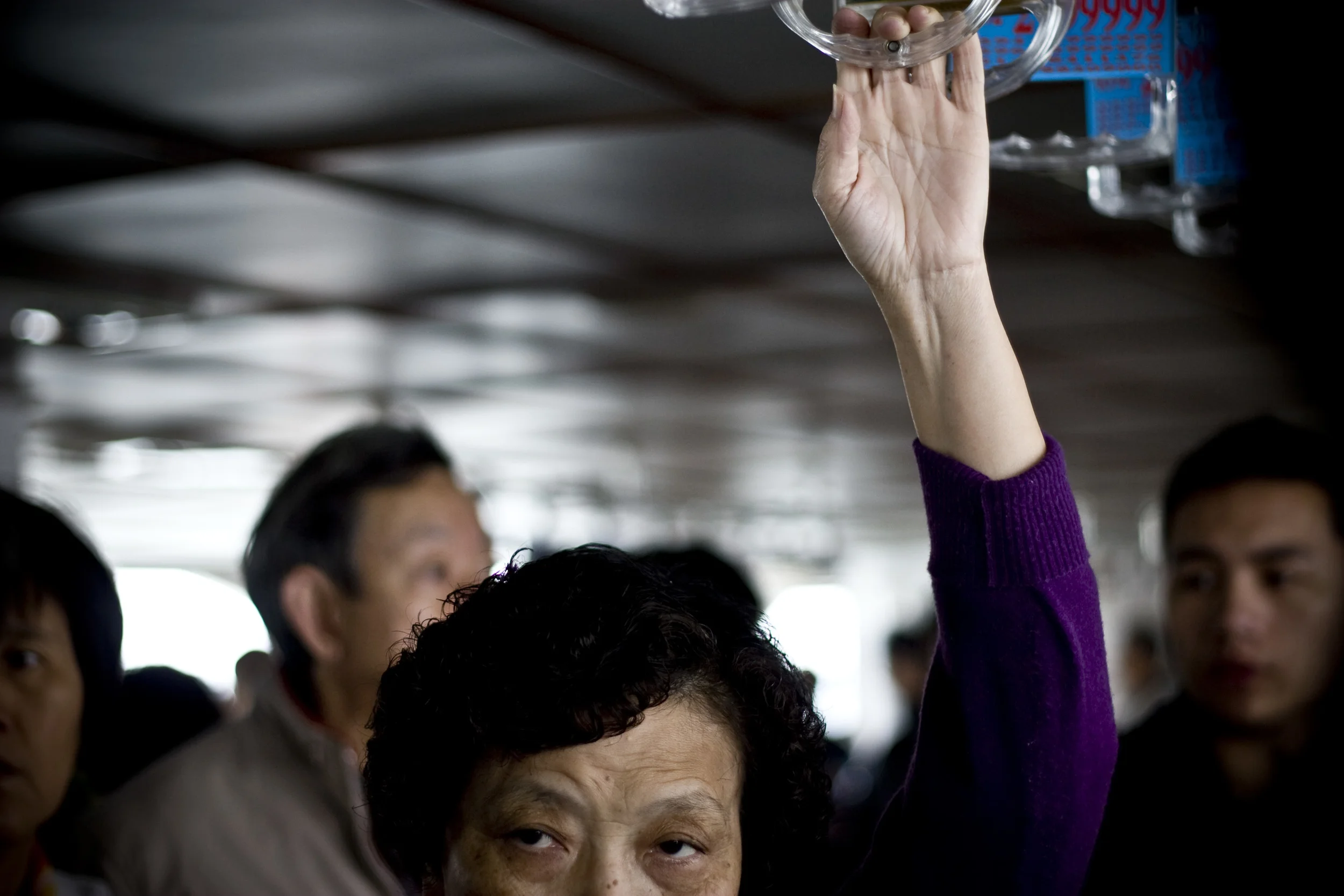  ​A commuter rides a ferry from Gulangyu Island to the mainland, Xiamen, in southern China.&nbsp; 